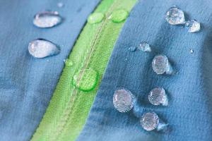 Waterproof textile with zipper repels water photo