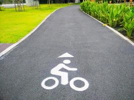 Bicycle road sign in the park photo