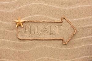 Arrow made of rope with the word Phuket photo