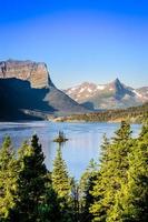 Vertical landscape view of mountain range in Glacier NP, USA photo