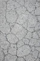 Cracked asphalt texture photo