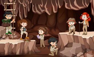 Scene with group of scouts exploring a cave vector