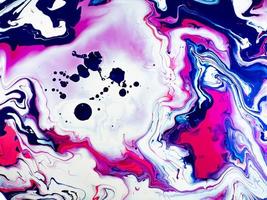 Pink and purple marbled paint photo