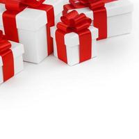 White gift boxes with red ribbons photo