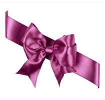 purple bow made from silk ribbon