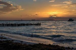 Sunset Isla Mujeres beach, tropical paradise, caribbean. Mexico photo