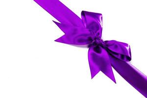 Purple ribbon with bow on white