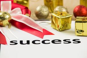 Text success with ribbon and gift