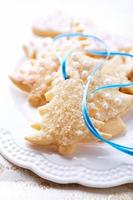 Iced Christmas cookies with sugar photo