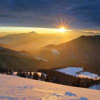 Winter mountain landscape with sun - Slovakia photo