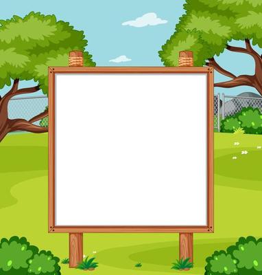 Blank wooden frame in nature park 