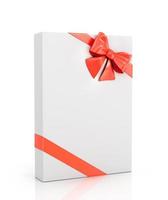 The white box wrapped with red ribbon with a bow photo