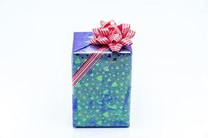 blue gift box with red ribbon bow