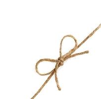 string or twine tied in a bow isolated on white