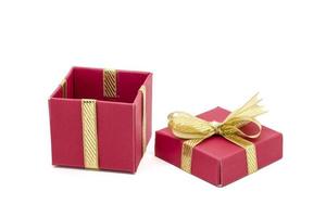 christmas gift box with a gold ribbon bow