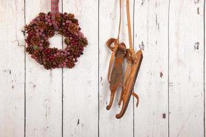 Christmas wreath on wooden wall