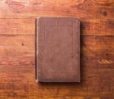 Photo blank book cover on textured wood background