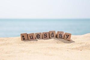 Tuesday word on sea beach