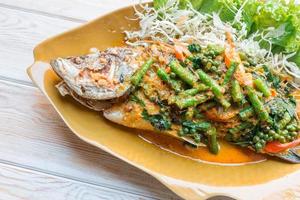 Spicy Sea Bass Soupsteamed, Thai style steamed fish photo