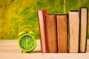 Vintage books and clock photo