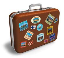 Leather travel suitcase with labels photo