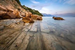 Rocky Beach and Transparent Adriatic Sea near Omis