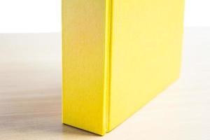 Yellow book  on the table.