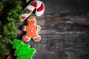 Christmas cookies on rustic wooden background photo