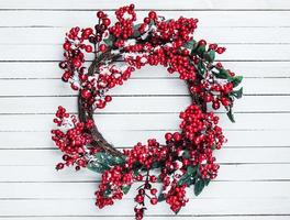 Christmas wreath on a wooden background photo