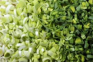 Thinly sliced leek from white to green photo