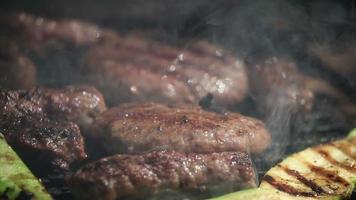 Burger and cevapcici on grill video