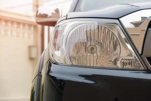 Closeup of car headlight photo