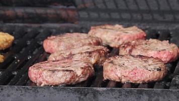 Burgers On A Sizzling BBQ video