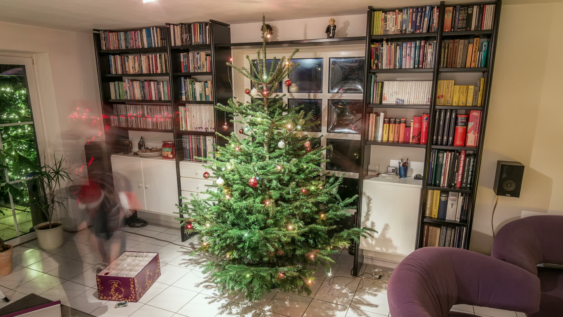 Decorating the christmas tree on christmas eve 1384796 Stock Video at