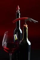 red wine and corkscrew photo