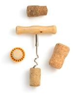 corkscrew and wine cork on white
