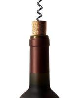 corkscrew with a bottle of wine isolated on a white background photo