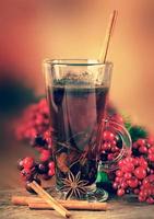 Mulled wine from wine and cinnamon photo