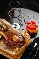 Steak with red wine photo