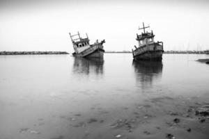Old fishing boat, white and black. photo
