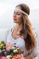 girl with a wedding bouquet boho style photo