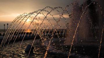 City fountain at sunset. photo