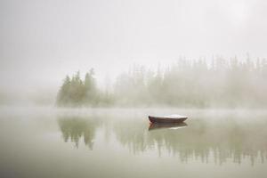 Boat in mysterious fog photo
