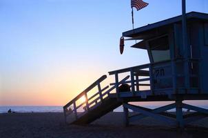 Lifeguard Hut on Santa Monica Beach at Sunset photo