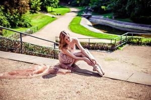 Ballerina in the park wearing points