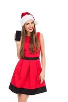 Santa girl presenting a mobile phone