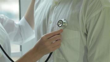 A stethoscope on the patient's chest video