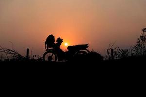 Silhouette of motorcycle photo