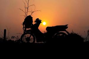Silhouette of motorcycle photo