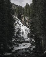 Waterfall between trees  photo